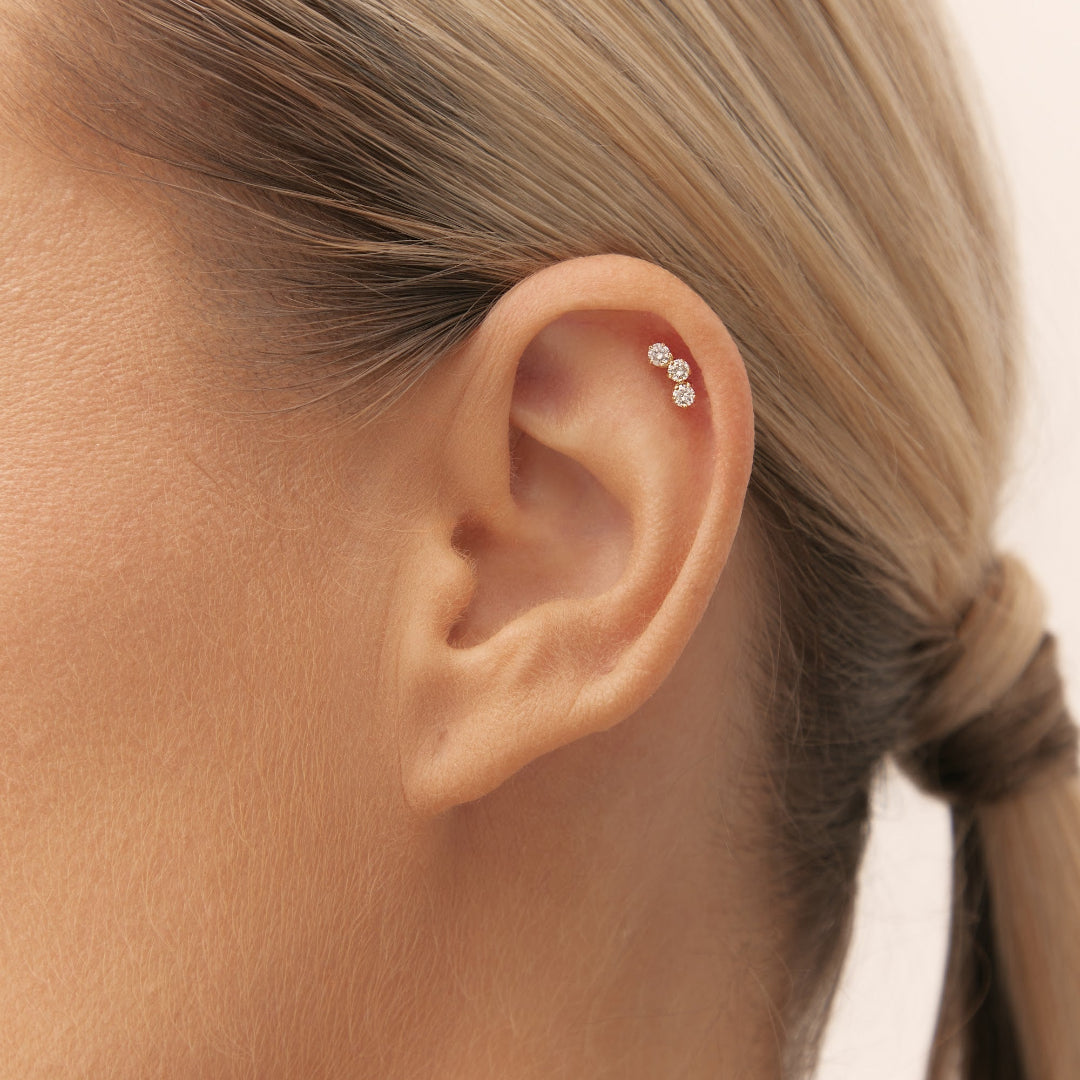 Diamond piercing in yellow gold