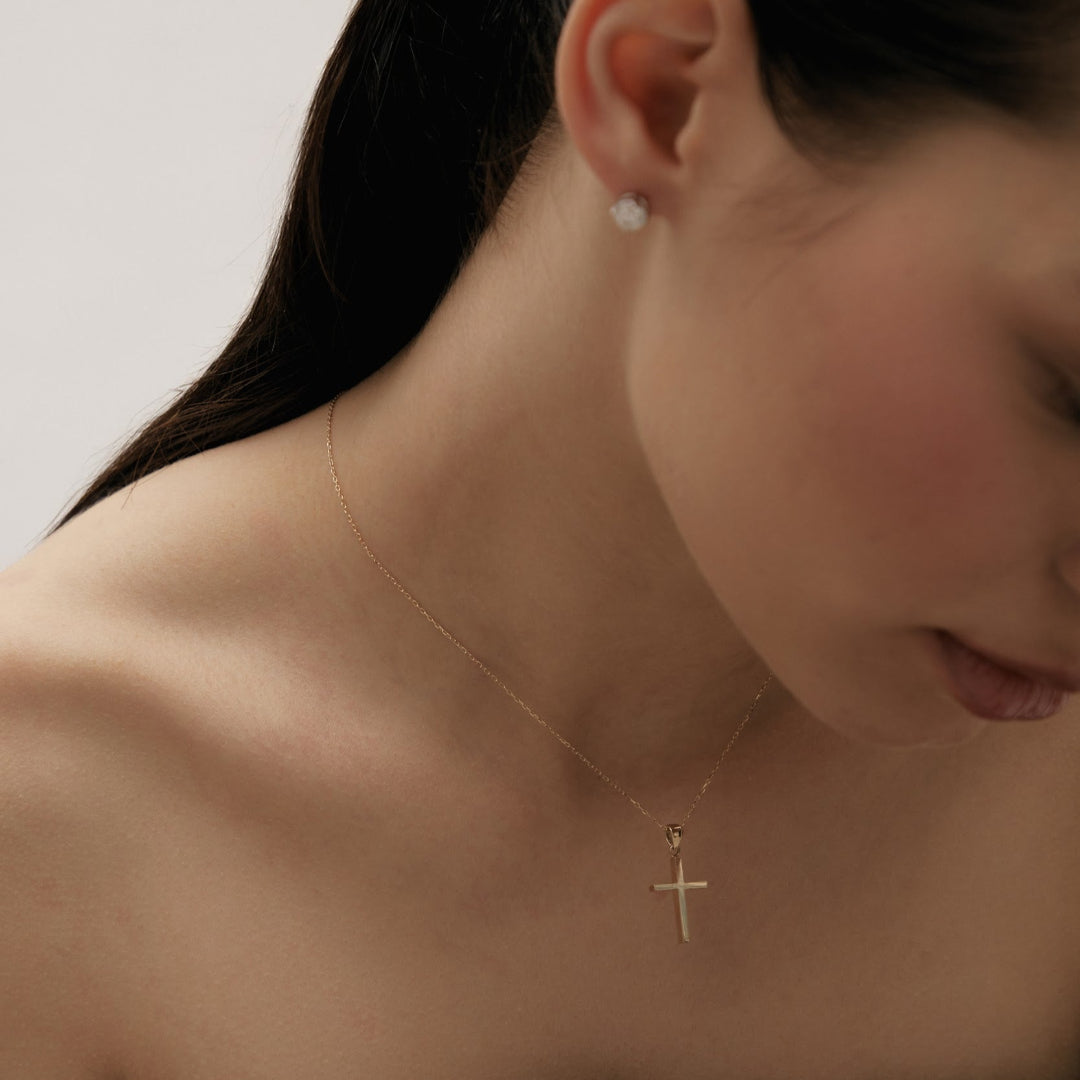 Yellow gold cross pendant