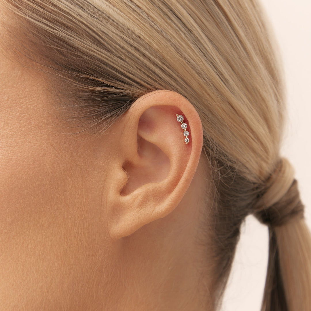 Diamond piercing in yellow gold