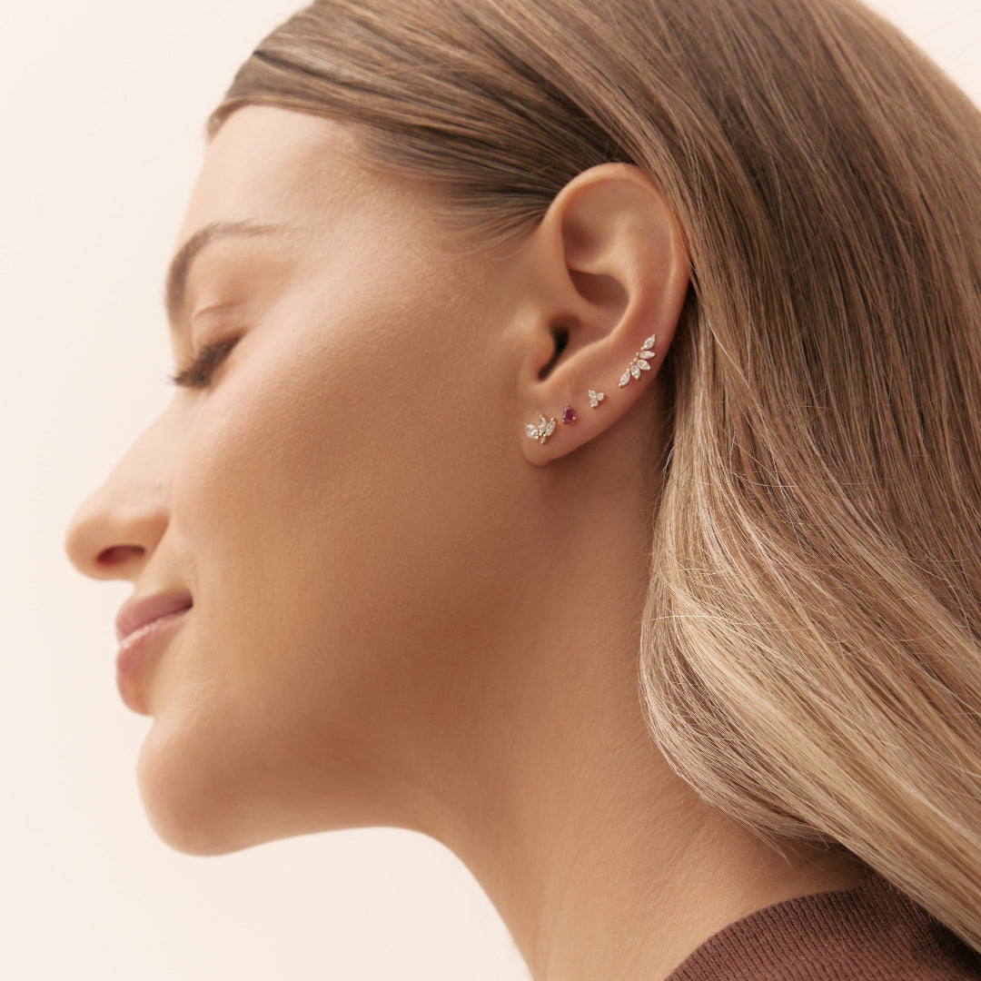 Ruby piercing in yellow gold